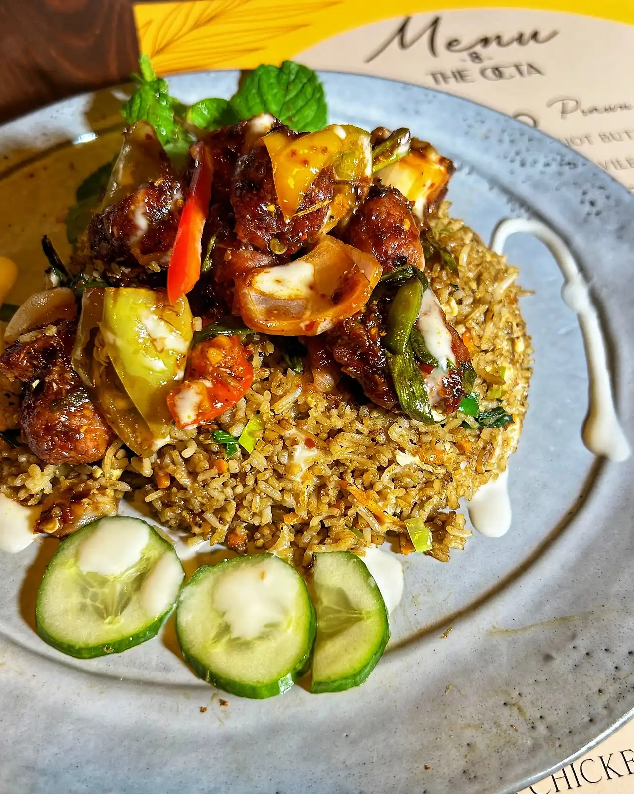 Fried rice with devilled chicken and cucumber