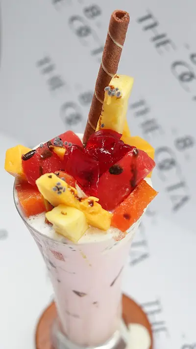 Fruit faluda sundae in a tall glass