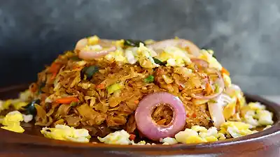 Mix kottu with cuttlefish, egg and onion