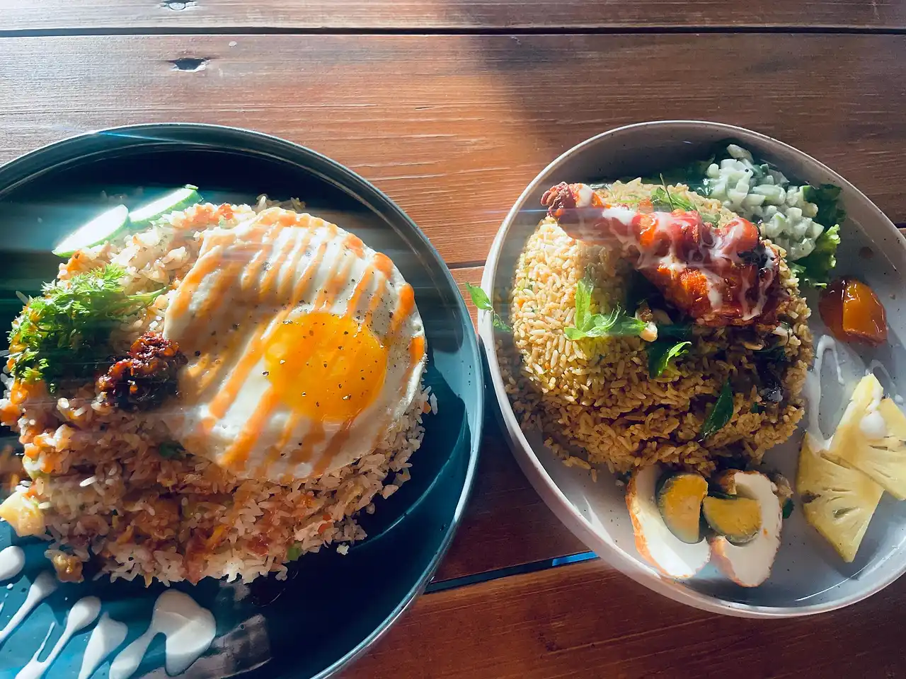 Fried rice with a fried egg and a devilled side, photographed by a guest